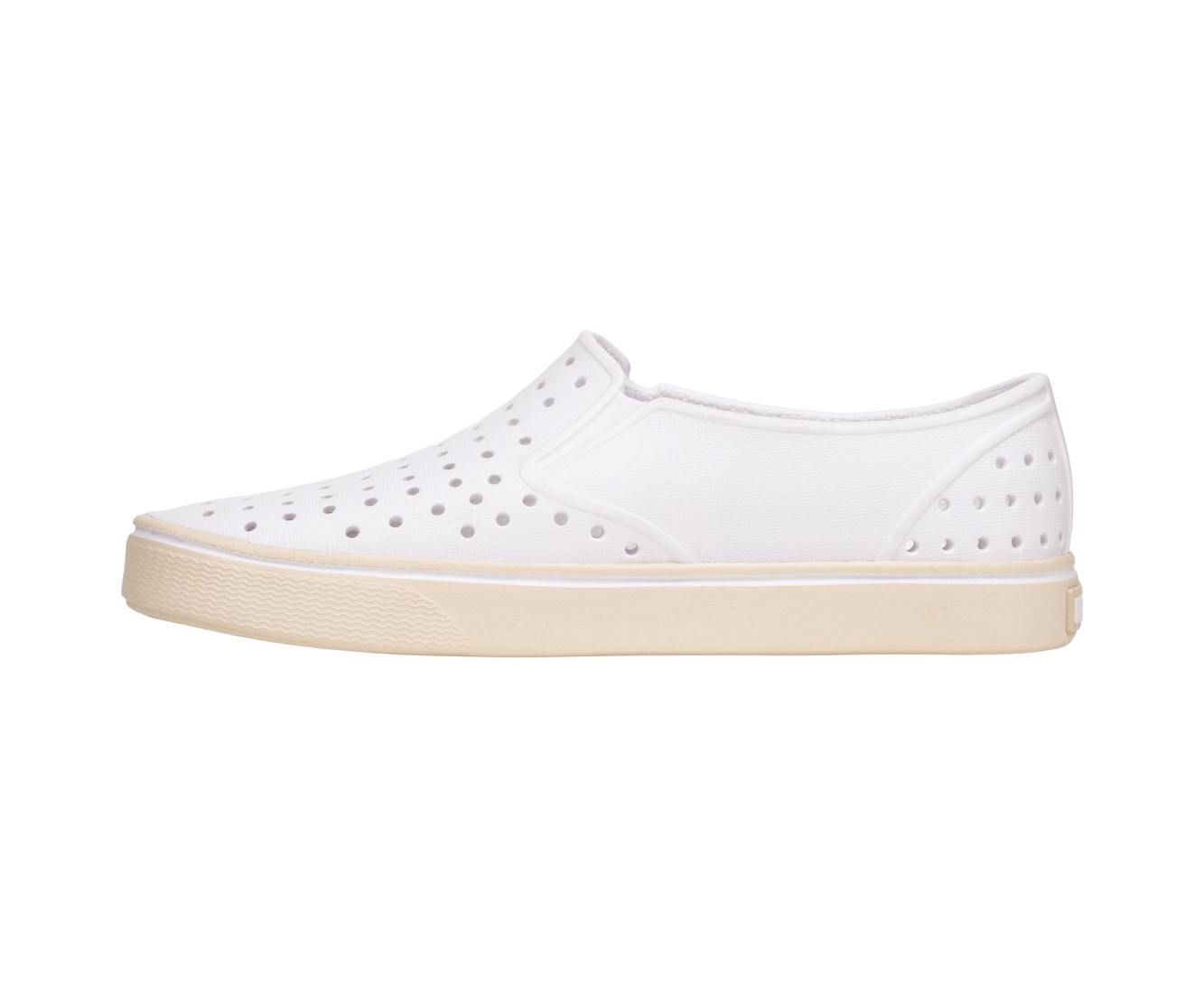 Angled view of a Native Shoes Miles Wanderfoam | Shell White / Bone White Footwear in Shell White / Bone White