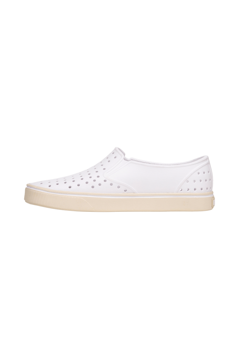 Angled view of a Native Shoes Miles Wanderfoam | Shell White / Bone White Footwear in Shell White / Bone White