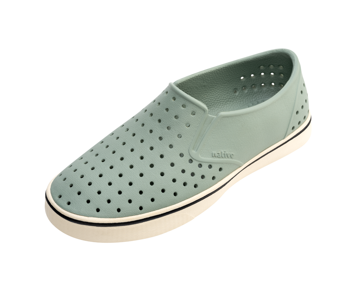 Angled view of a Native Shoes Miles Wanderfoam | Relax Green / Bone White Footwear in Relax Green / Bone White