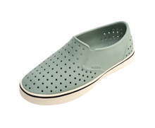 Angled view of a Native Shoes Miles Wanderfoam | Relax Green / Bone White Footwear in Relax Green / Bone White
