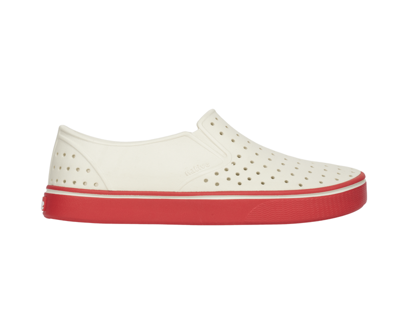 Side view of a Native Shoes Adults Miles Wanderfoam Footwear in Bnwht/Luckrd