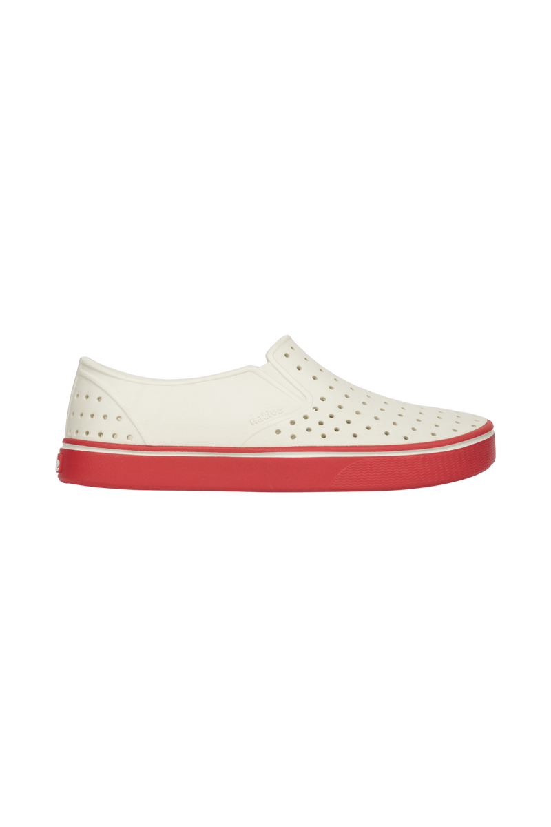 Side view of a Native Shoes Adults Miles Wanderfoam Footwear in Bnwht/Luckrd
