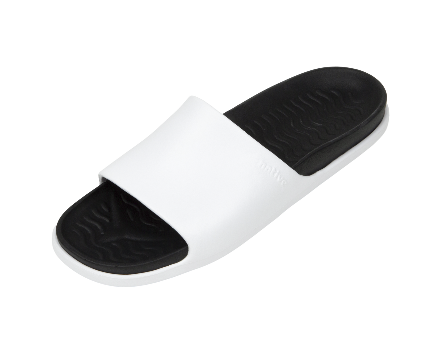 Angled view of a Native Shoes Spencer Lx Wanderfoam | Shell White / Jiffy Black Footwear in Shell White / Jiffy Black