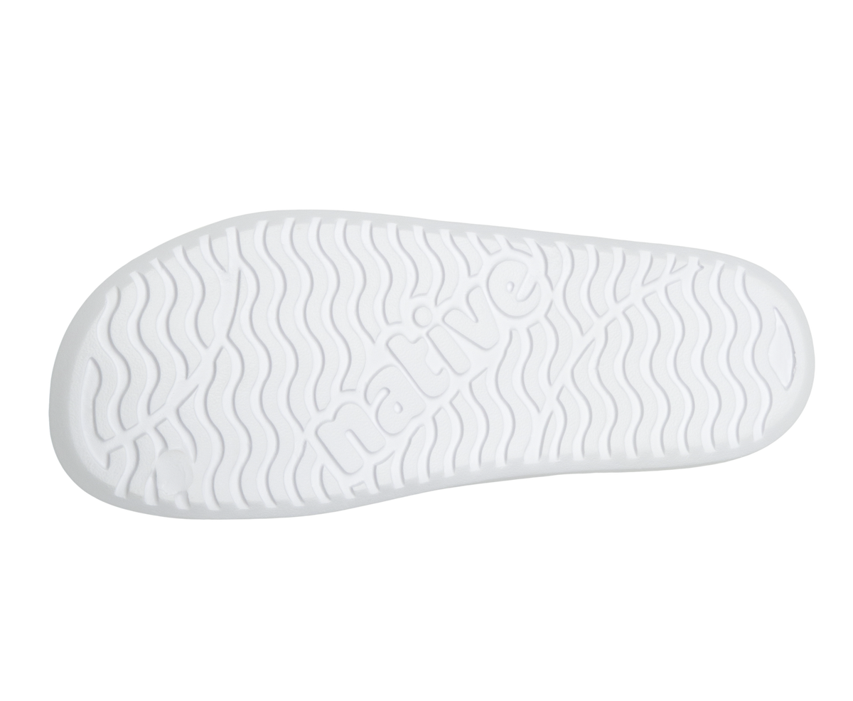 Bottom view of a Native Shoes Spencer Lx Wanderfoam | Shell White / Jiffy Black Footwear in Shell White / Jiffy Black