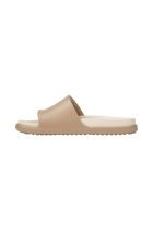 Angled view of a Native Shoes Spencer Lx Wanderfoam | Flax Tan / Bone White Footwear in Flax Tan / Bone White