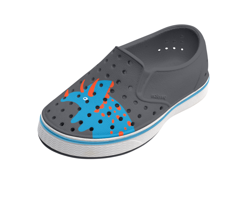 Angled view of a Native Shoes Kids Miles Block Kids | Gravity Grey / Shell White / Dinosaur Block Footwear in Gravity Grey / Shell White / Dinosaur Block