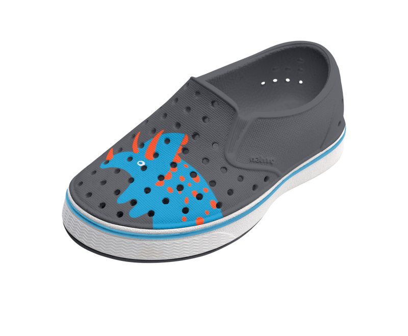 Angled view of a Native Shoes Kids Miles Block Kids | Gravity Grey / Shell White / Dinosaur Block Footwear in Gravity Grey / Shell White / Dinosaur Block
