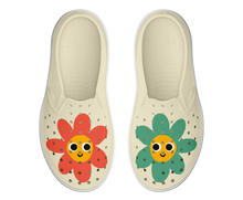 Side view of a Native Shoes Kids Miles Block Kids Footwear in Bone White / Shell White / Happy Flower Block