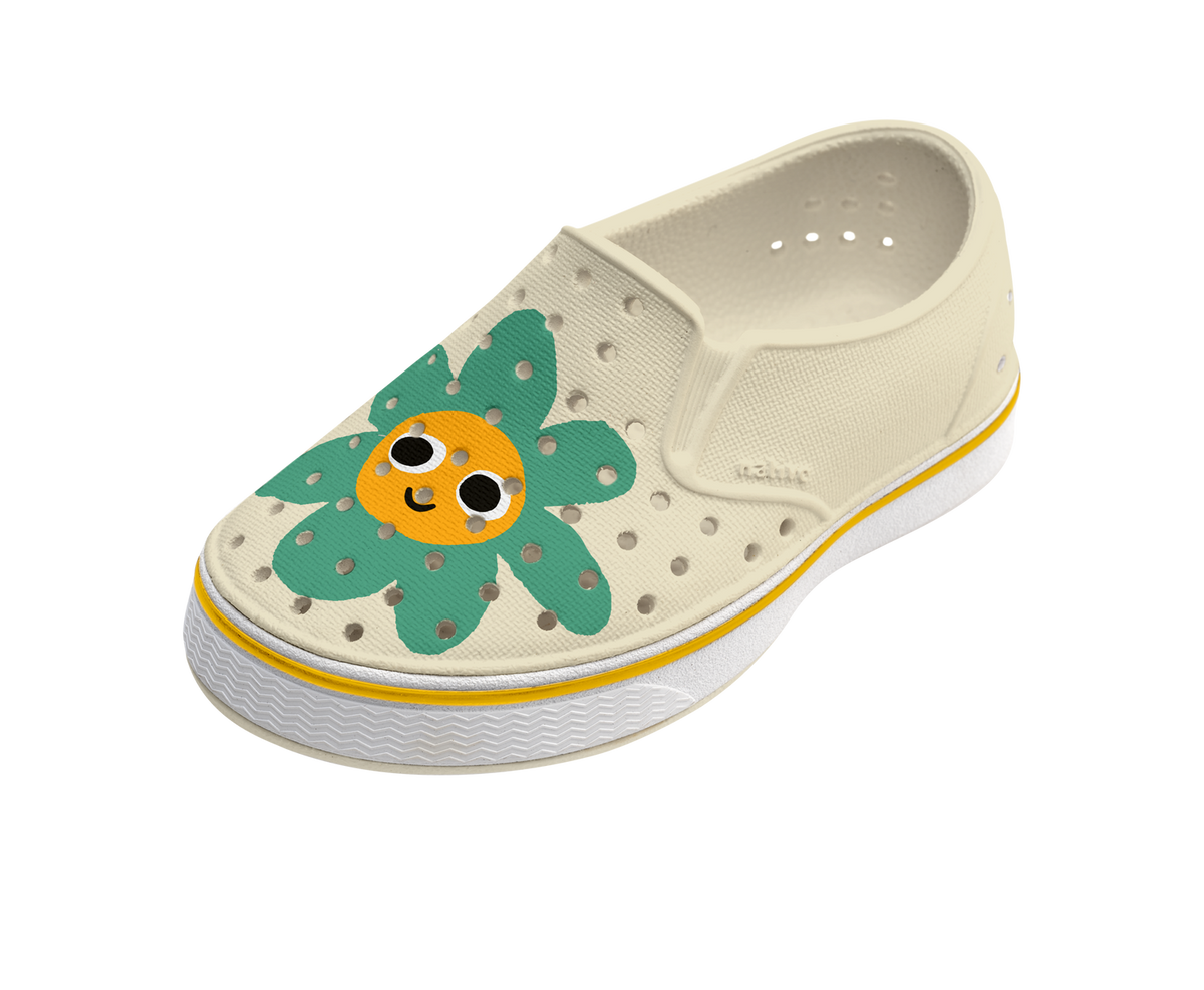 Angled view of a Native Shoes Kids Miles Block Kids | Bone White / Shell White / Happy Flower Block Footwear in Bone White / Shell White / Happy Flower Block