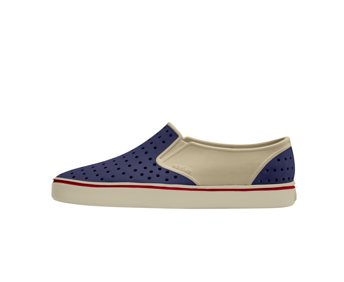 Side view of a Native Shoes Adults Miles Wanderfoam Block Footwear in Taos Tan / Bone White / Regatta Block