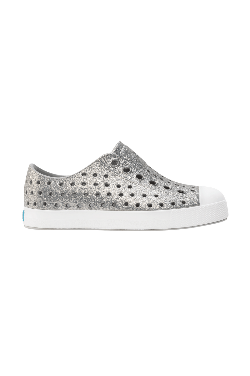 Side view of a Native Shoes Kids Jefferson Bio-Bling Kids Footwear in Platinum Bling / Shell White