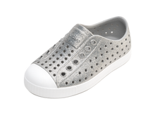 Angled view of a Native Shoes Kids Jefferson Bio-Bling Kids | Platinum Bling / Shell White Footwear in Platinum Bling / Shell White