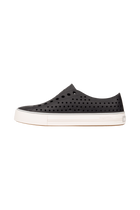 Angled view of a Native Shoes Jefferson Arc Wanderfoam | Jiffy Black / Whisper White Footwear in Jiffy Black / Whisper White