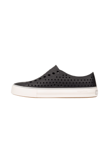 Angled view of a Native Shoes Jefferson Arc Wanderfoam | Jiffy Black / Whisper White Footwear in Jiffy Black / Whisper White