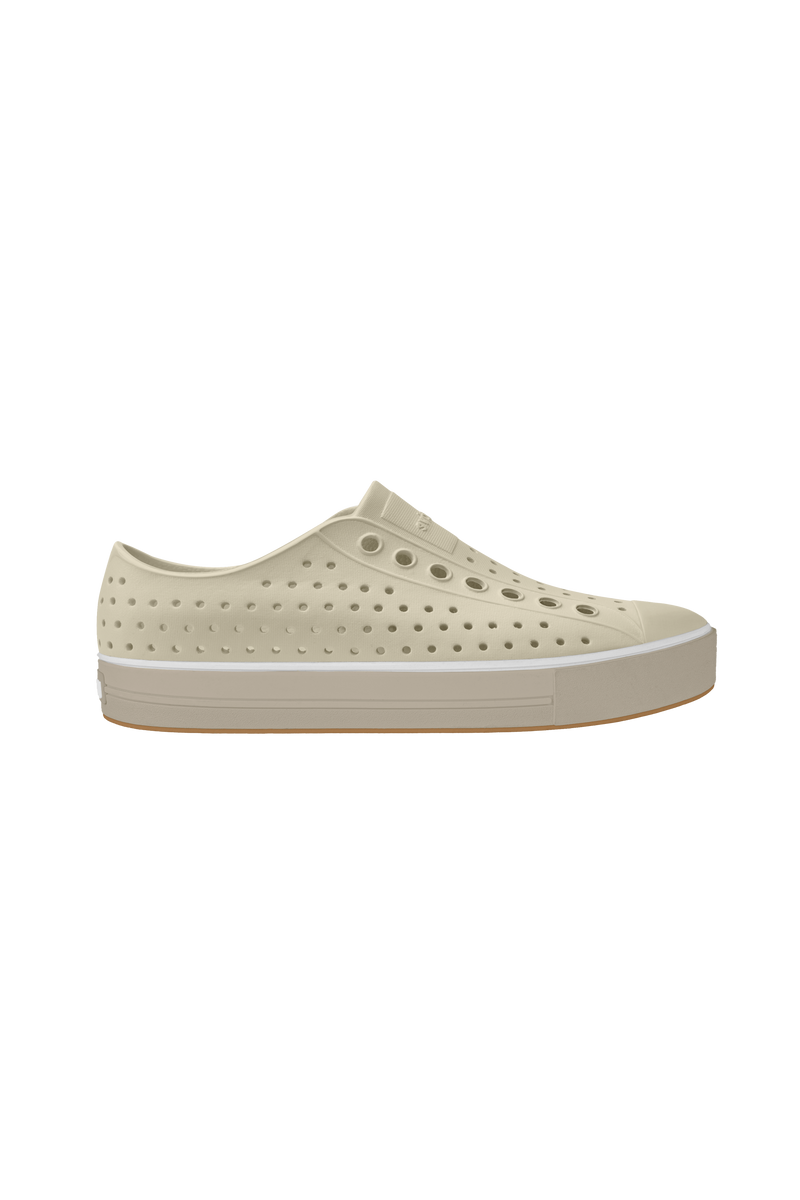Side view of a Native Shoes Adults Jefferson Arc Wanderfoam Footwear in Bone White / Fog Beige