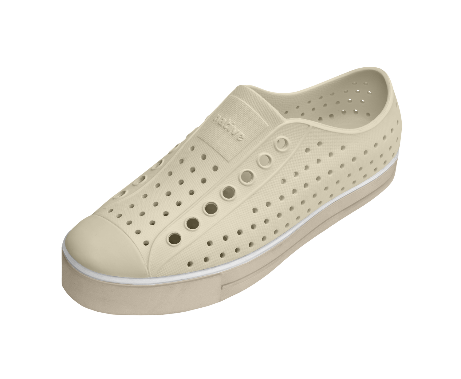 Angled view of a Native Shoes Jefferson Arc Wanderfoam | Bone White / Fog Beige Footwear in Bone White / Fog Beige