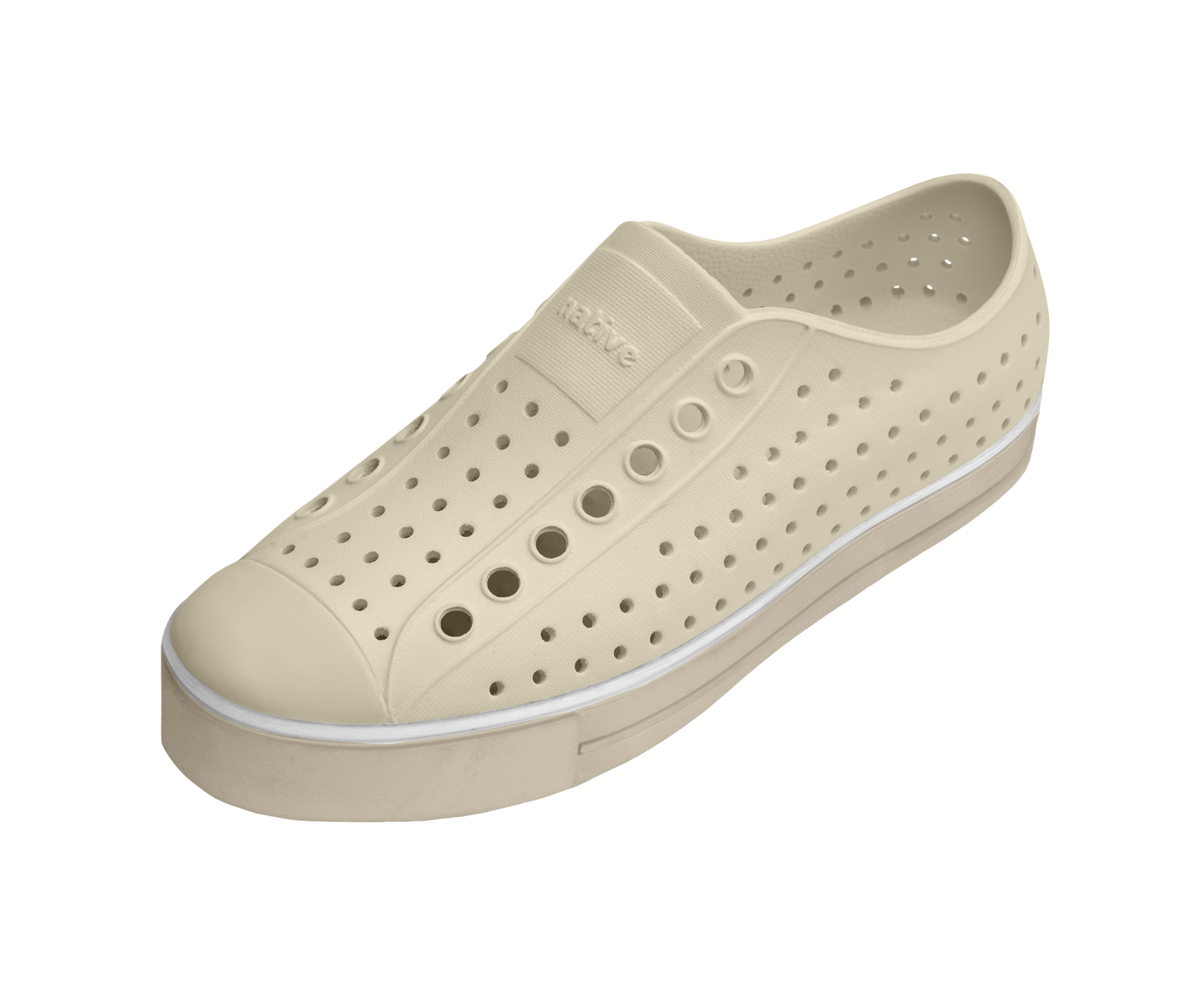 Angled view of a Native Shoes Jefferson Arc Wanderfoam | Bone White / Fog Beige Footwear in Bone White / Fog Beige