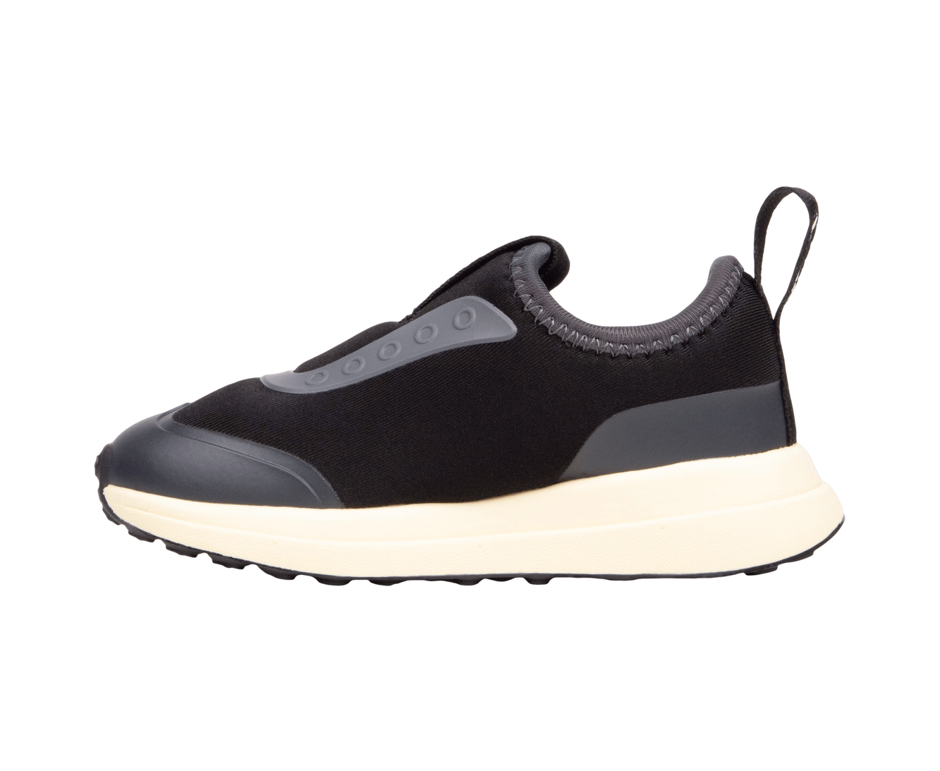 Angled view of a Native Shoes Kids Robbie Dash Kids | Jiffy Black / Tapioca Off White / Jiffy Black Footwear in Jiffy Black / Tapioca Off White / Jiffy Black