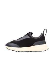Angled view of a Native Shoes Kids Robbie Dash Kids | Jiffy Black / Tapioca Off White / Jiffy Black Footwear in Jiffy Black / Tapioca Off White / Jiffy Black