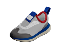 Angled view of a Native Shoes Kids Robbie Dash Kids | Hyams Grey / Tapioca Uv / Jiffy Black Footwear in Hyams Grey / Tapioca Uv / Jiffy Black