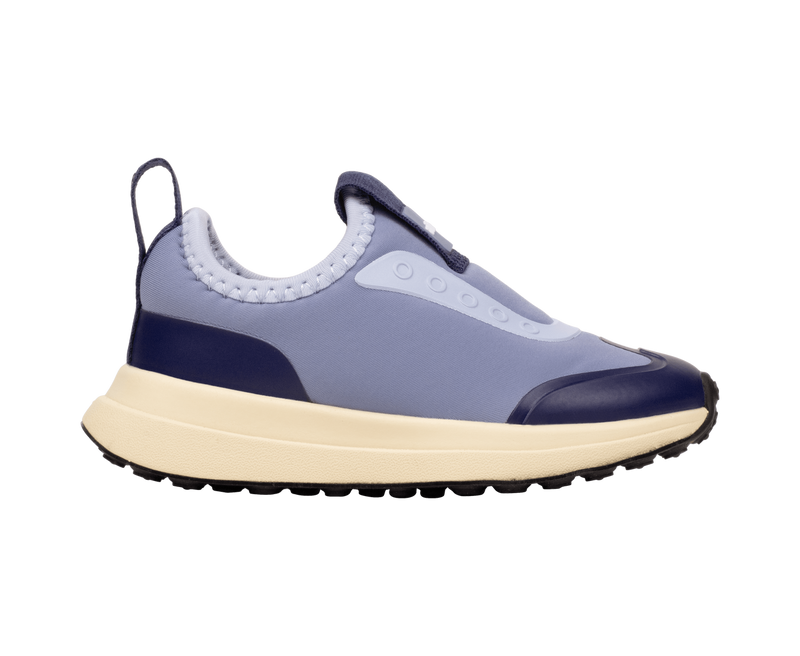 Side view of a Native Shoes Kids Robbie Dash Kids Footwear in Oasisbl/Tapoffwht/Jfyblk
