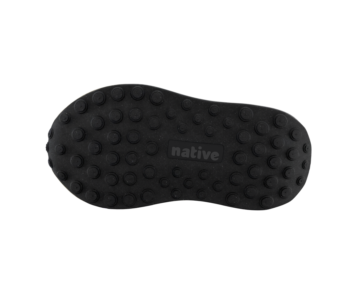 Bottom view of a Native Shoes Kids Robbie Dash Kids | Megamarine Blue / Tapioca Off White / Jiffy Black Footwear in Megamarine Blue / Tapioca Off White / Jiffy Black