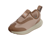 Angled view of a Native Shoes Kids Robbie Dash Kids | Chameleon Pink / Tapioca Off White / Hazel Brown Footwear in Chameleon Pink / Tapioca Off White / Hazel Brown