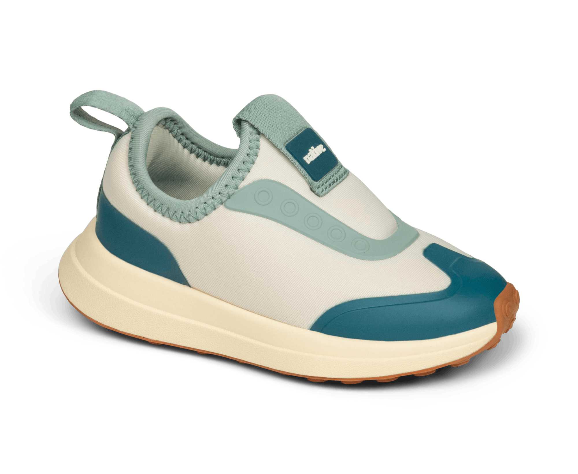 Angled view of a Native Shoes Kids Robbie Dash Kids | Bone White / Tapioca Off White / Hazel Brown Footwear in Bone White / Tapioca Off White / Hazel Brown