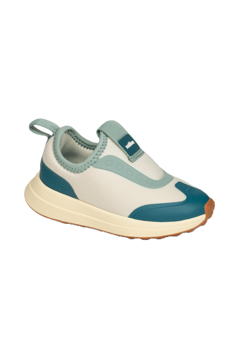 Angled view of a Native Shoes Kids Robbie Dash Kids | Bone White / Tapioca Off White / Hazel Brown Footwear in Bone White / Tapioca Off White / Hazel Brown
