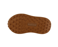 Bottom view of a Native Shoes Kids Robbie Dash Kids | Bone White / Tapioca Off White / Hazel Brown Footwear in Bone White / Tapioca Off White / Hazel Brown