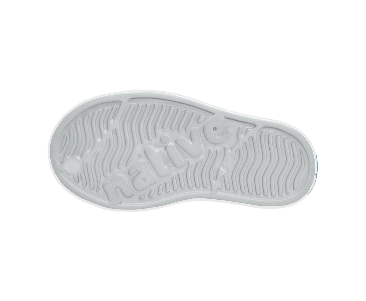 Bottom view of a Native Shoes Kids Jefferson Stonewash Kids | Dawn Blue / Dawn Blue / Satellite Brushed Footwear in Dawn Blue / Dawn Blue / Satellite Brushed