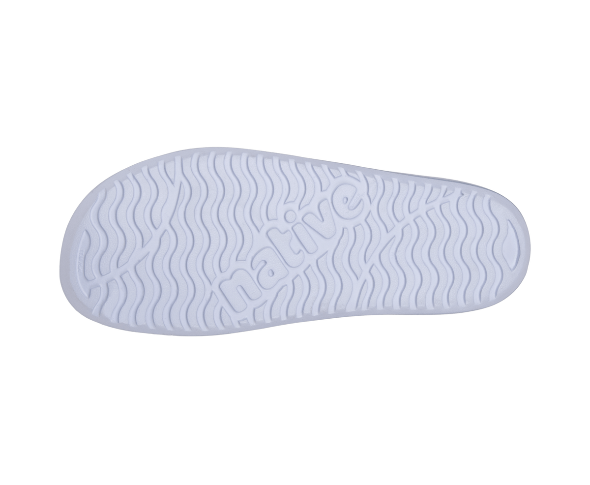 Bottom view of a Native Shoes Spencer Lx Wanderfoam Metallic | Skyway Blue Metallic / Harbor Blue Footwear in Skyway Blue Metallic / Harbor Blue