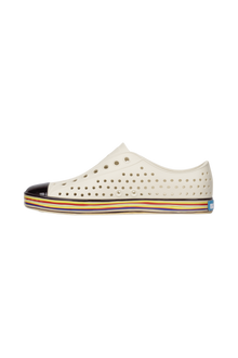 Angled view of a Native Shoes Jefferson Wanderfoam Wrp | Bnwht/Strtarnbw Footwear in Bnwht/Strtarnbw