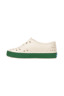 Angled view of a Native Shoes Kids Miller Kids | Bnwht/Hntrgr Footwear in Bnwht/Hntrgr