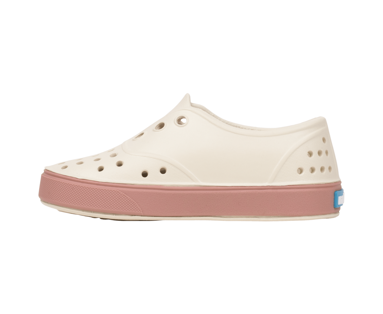 Angled view of a Native Shoes Kids Miller Kids | Bnwht/Caypnk Footwear in Bnwht/Caypnk