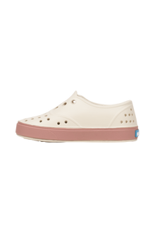 Angled view of a Native Shoes Kids Miller Kids | Bnwht/Caypnk Footwear in Bnwht/Caypnk