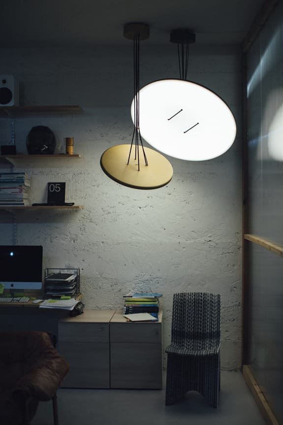 A lamp designed by ANDlight in a dark room