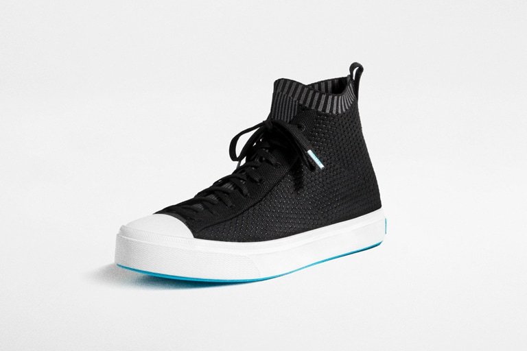 Image of the Jefferson high in black showing features such as recycled insole zero waste production, ultra light outsole and slip on knit technology. 