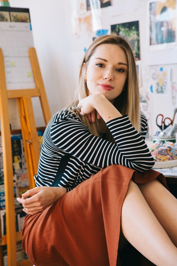 Ola Volo sitting in her studio.