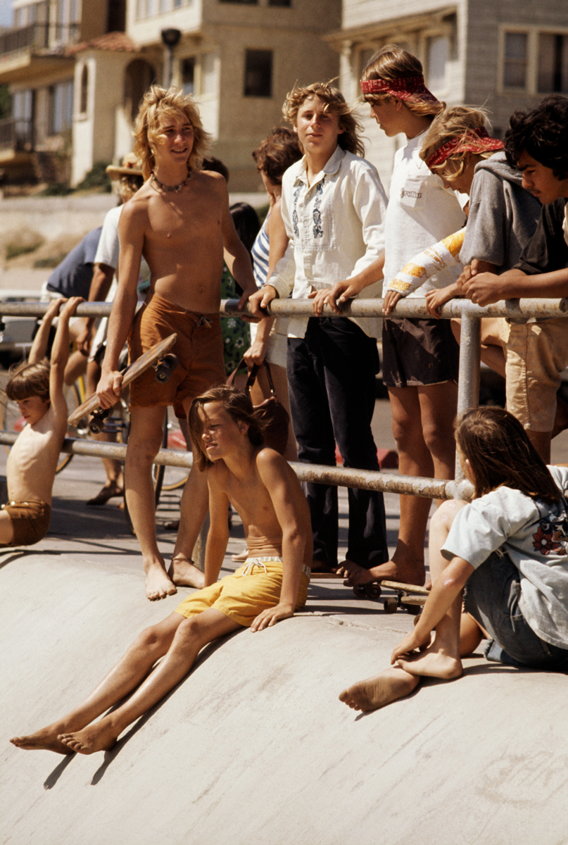 Hugh Holland photographer of group of teenage skateboarders hanging out