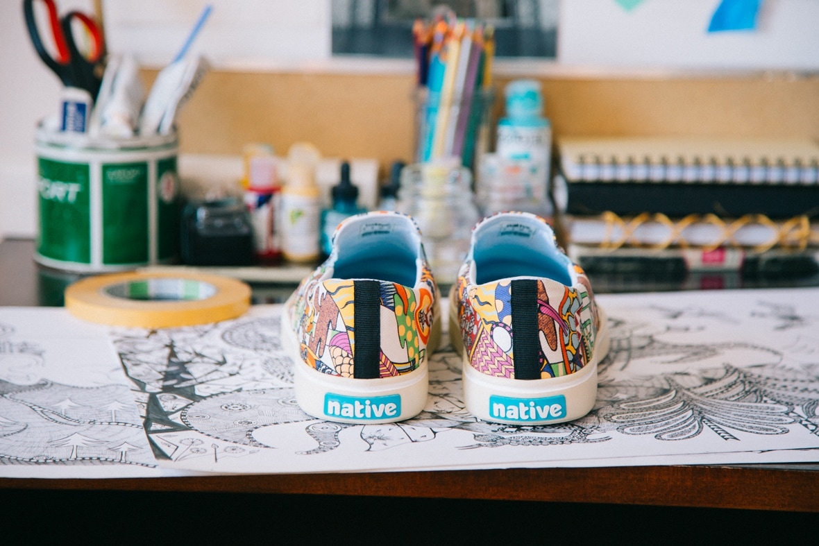 Native Shoes Ola Volo print collaboration shoes sitting on sketches in her studio.