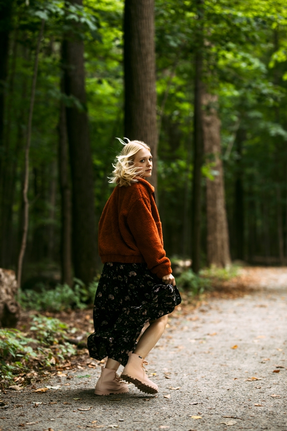 Woman wearing the Johnny Treklite waterproof boots with a winter outfit in the woods